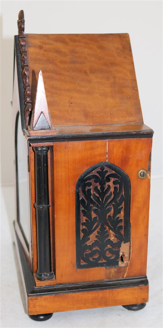 An early Victorian ebony and satinwood mantel timepiece, 13.5in.